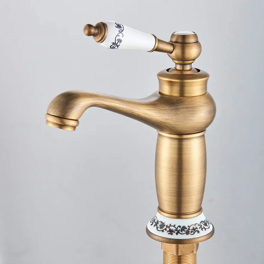 DecorBites antique brass kitchen sink faucet with white ceramic handle and black floral patterns single handle mixer