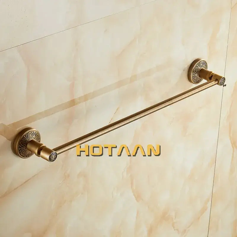 DecorBites antique brass single towel bar with ornate floral-patterned circular ends wall mounted bathroom holder
