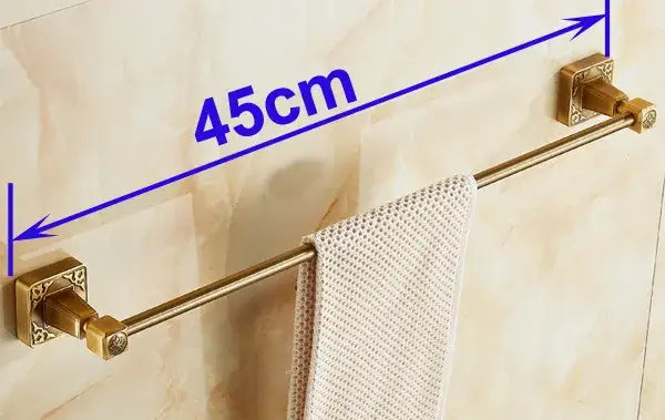 Decorbites™ antique brass single towel bar in brass color with ornate square ends and 45cm length wall mounted