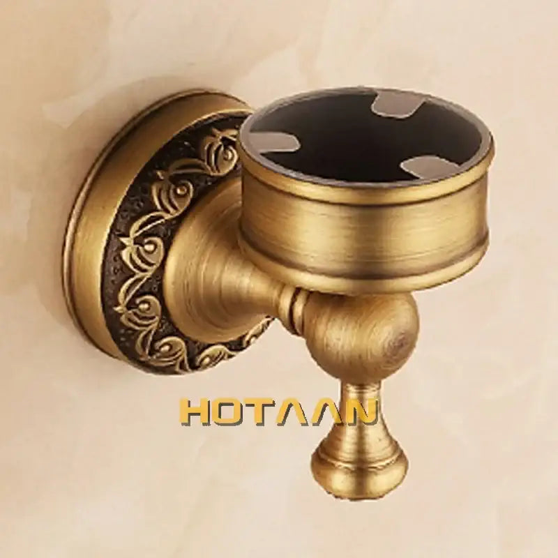 Decorbites antique brass soap holder with ornate scrollwork detailing and black interior for bathroom use