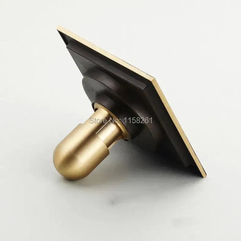 Decorbites antique brass square floor drain strainer grate with brass and black matte finish and square plate design