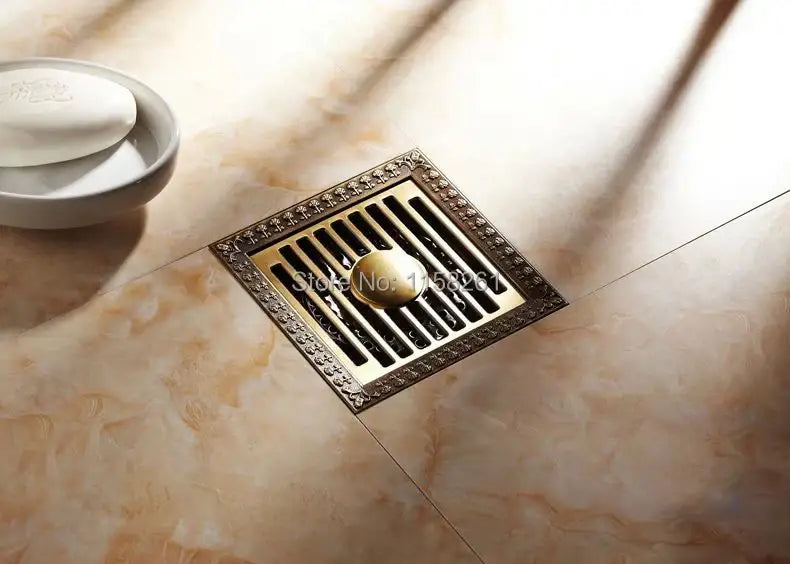 Antique brass square floor drain with ornate border and slatted grate for shower use by decorbites hj-8702s