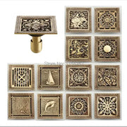 Decorbites antique brass square shower floor drain strainer grate with intricate floral and animal embossed designs
