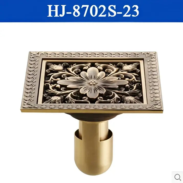 DecorBites antique brass square floor drain with ornate floral engraving and beaded border for shower floors