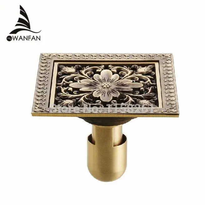 Brass rectangular floor drain with ornate floral design and beaded border antique brass square strainer grate