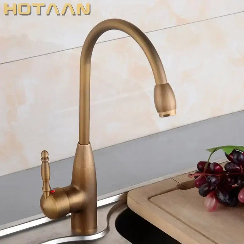 DecorBites™ antique brass swivel basin mixer tap with curved spout and ornate handle for kitchen and bathroom use