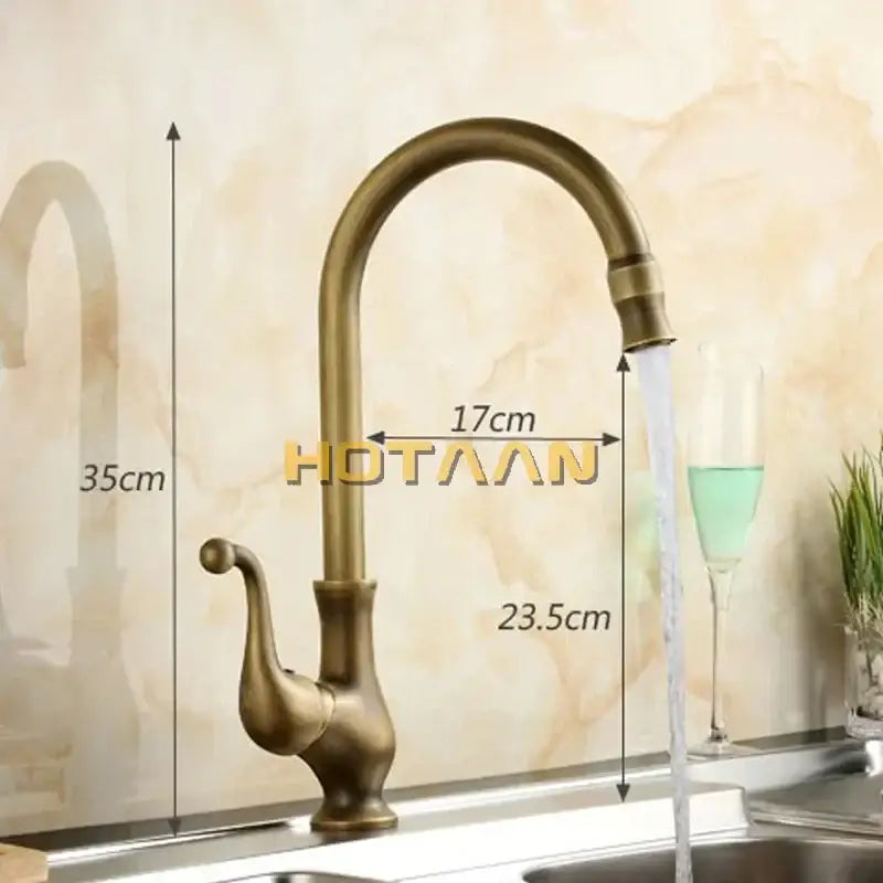 DecorBites™ antique brass swivel basin mixer tap with curved spout and ornate handle for elegant kitchen use