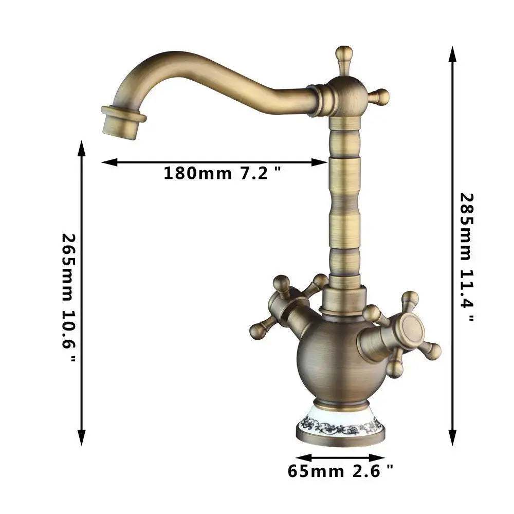 DecorBites antique brass swivel bathroom faucet mixer tap with ornate porcelain base and cross handles in antique brass finish