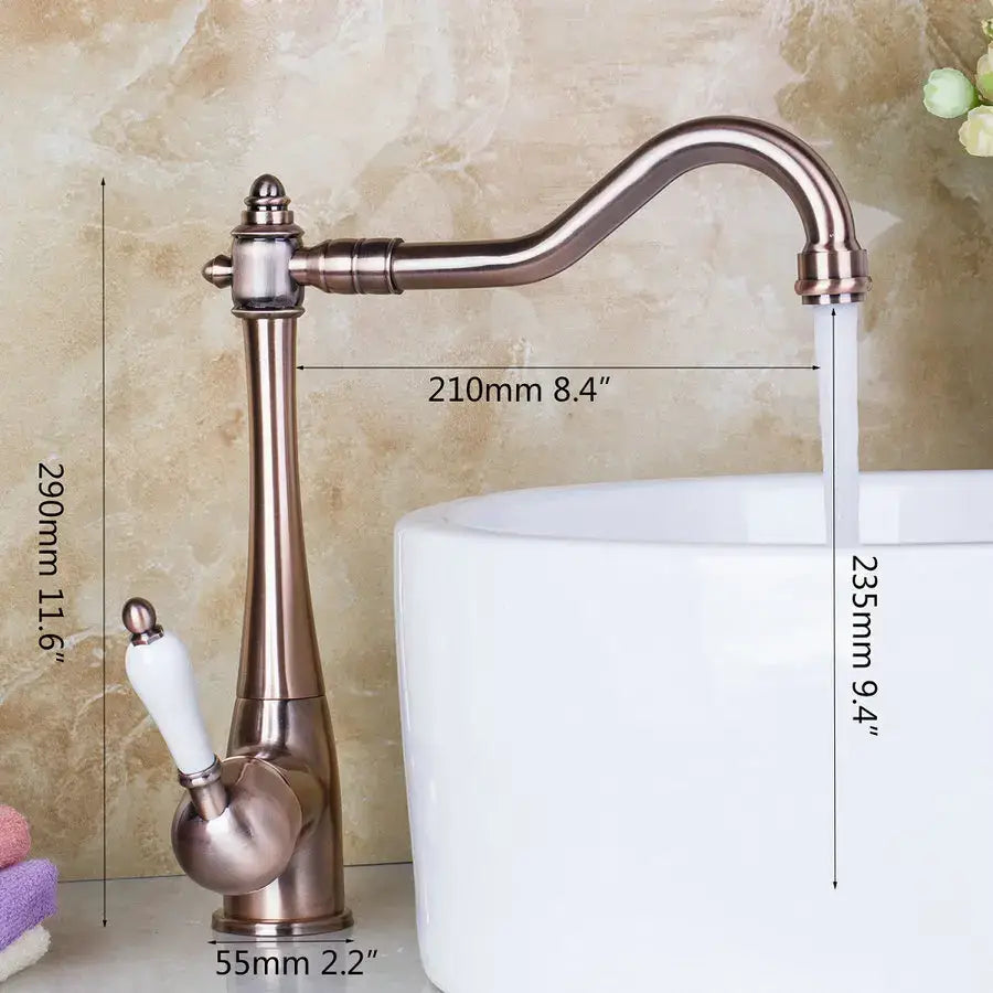 Decorbites antique brass kitchen faucet with curved spout and white ceramic handle for countertop sink use