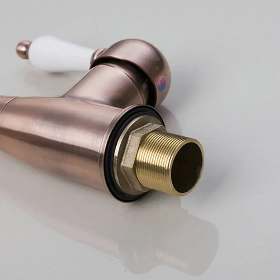 Decorbites antique brass kitchen faucet with rose gold finish, ceramic handle, and brass threaded spout for countertop sink