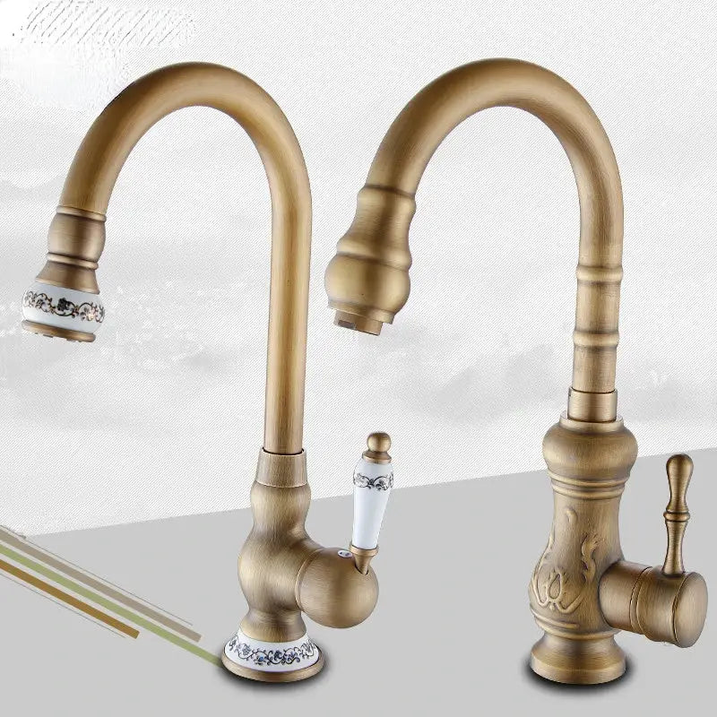 Decorbites™ antique brass swivel spout kitchen faucet with ornate detailing and white ceramic handles with blue floral patterns