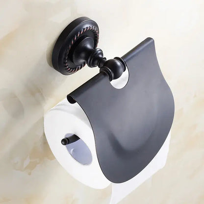 DecorBites antique brass toilet paper holder with black matte metal finish and rope-textured wall mount cover