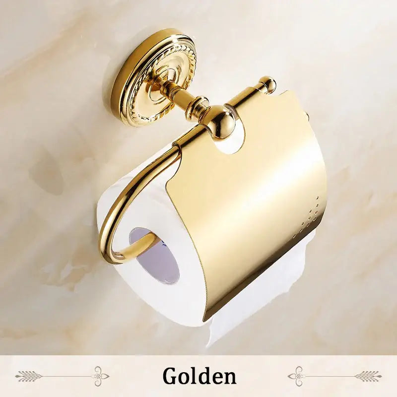 DecorBites antique brass toilet paper holder with ornate detailing and sleek curved design for wall mount use
