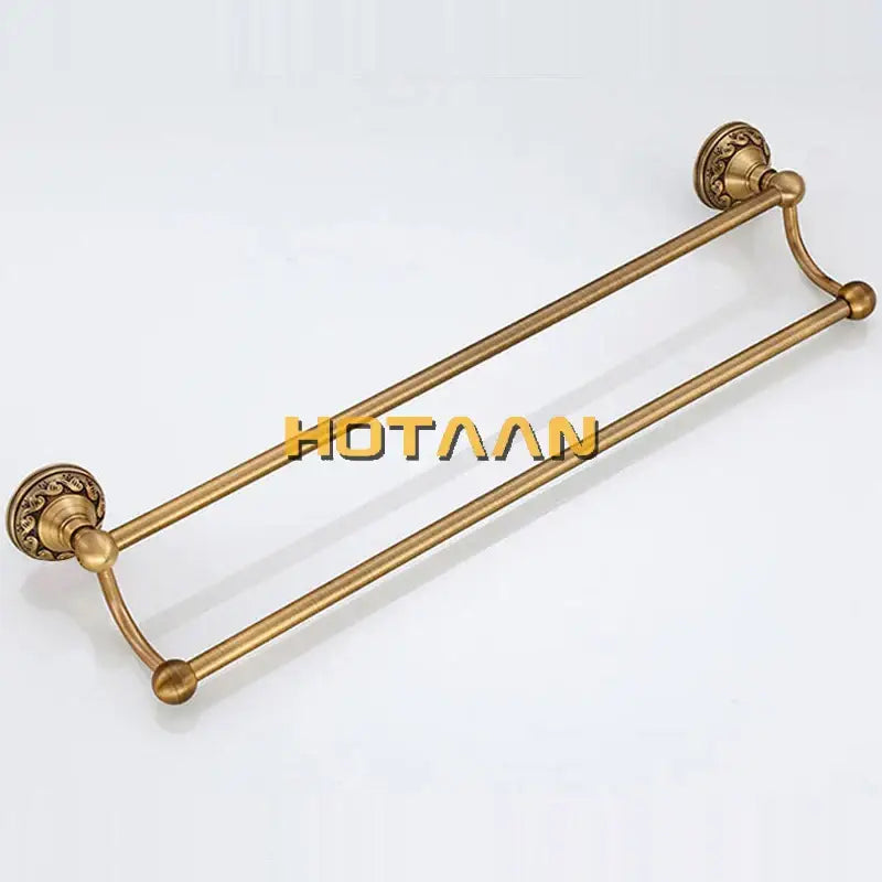 Antique brass single bar towel holder with ornate decorative end caps and solid aluminium rail by decorbites