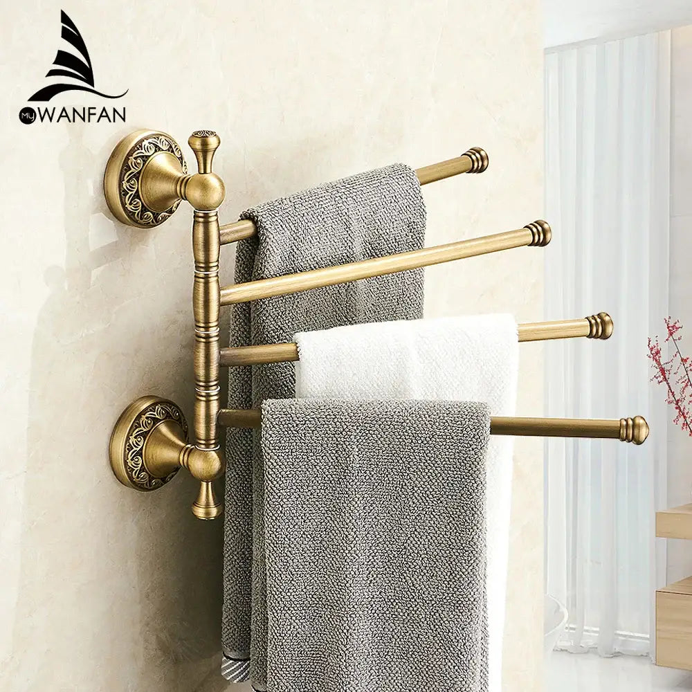 Decorbites antique brass towel rack with four horizontal bars and ornate circular bases for bathroom wall mounting