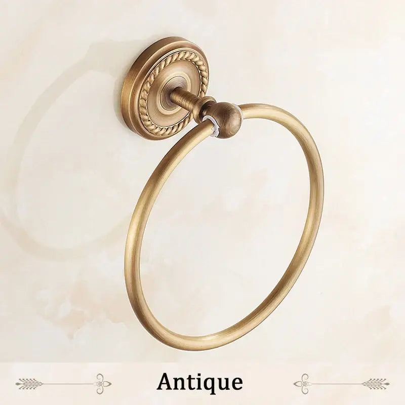 DecorBites antique brass towel ring with ornate rope-textured backplate and smooth rounded hoop for bathroom use