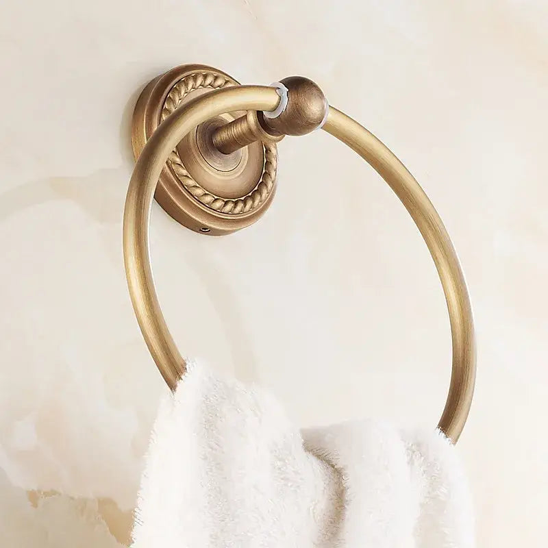 DecorBites antique brass towel ring with rope-textured design and decorative knob for bathroom towel holder