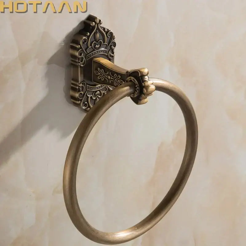 Decorbites antique brass towel ring with ornate crown wall mount and detailed floral engraving for bathroom use
