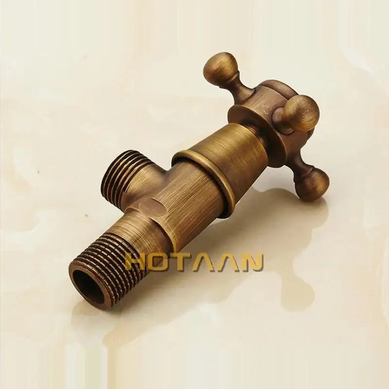 Antique brass triangle valve water control bathroom tap with antique brass finish and textured cross-handle design