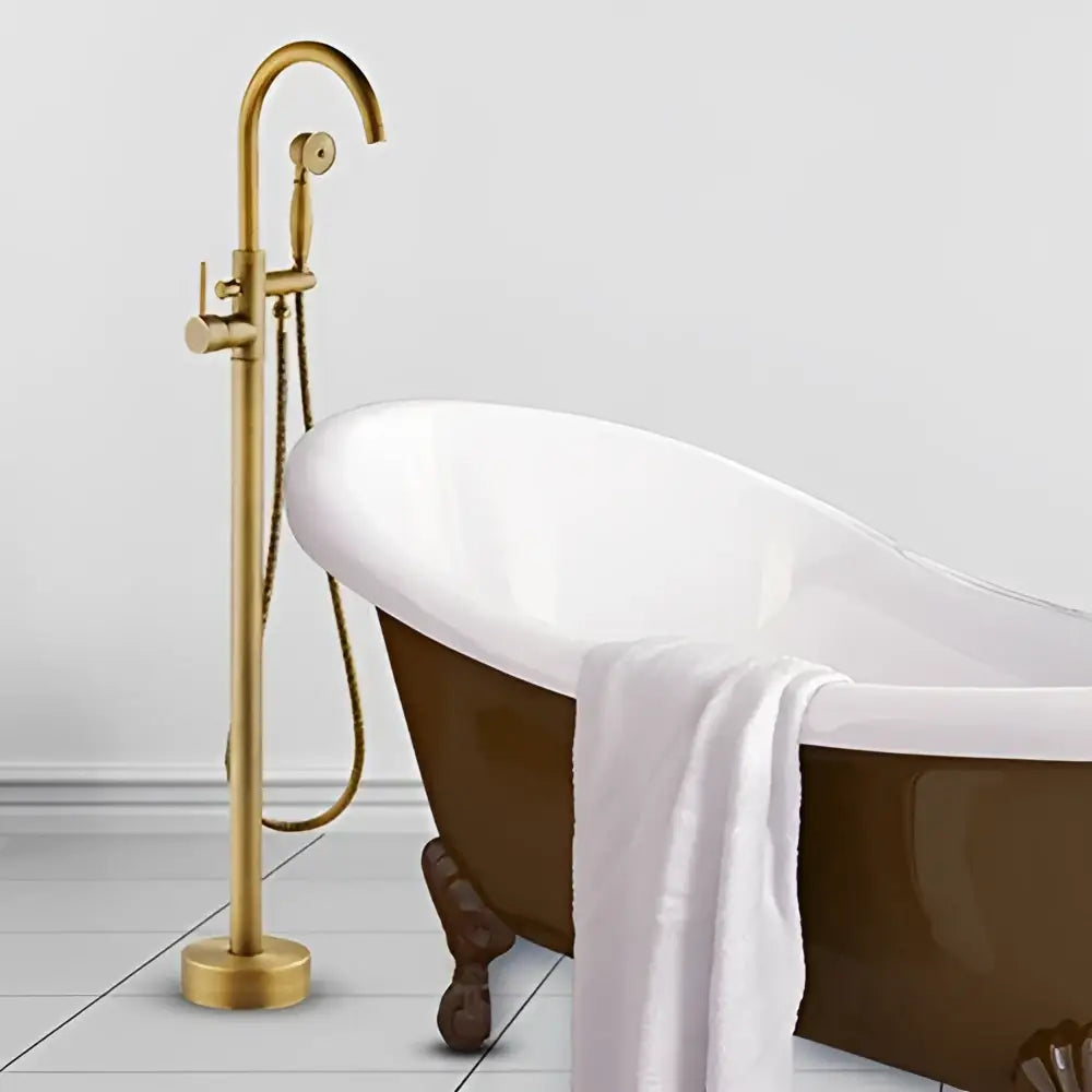 DecorBites™ antique brass tub faucet with swivel spout, curved design, and handheld showerhead mixer tap
