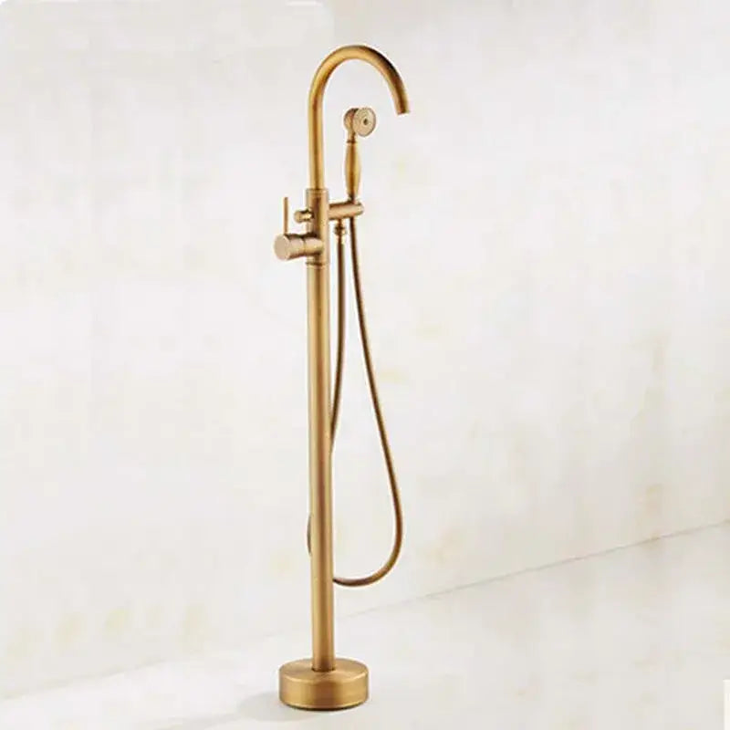 Decorbites™ antique brass tub faucet with gold finish swivel spout and detachable handheld showerhead mixer tap