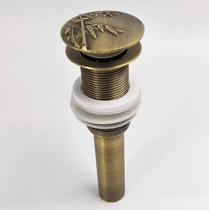 DecorBites antique brass vessel sink drain with bamboo leaf design on top plate for bathroom accessory