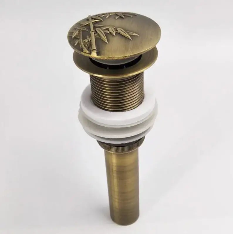 DecorBites antique brass vessel sink drain with bamboo leaf design on top plate for bathroom accessory