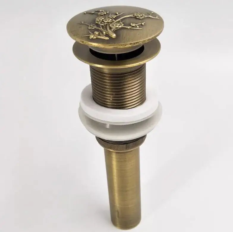 Decorbites antique brass vessel sink drain with floral engraved top and white ceramic washer for bathroom use