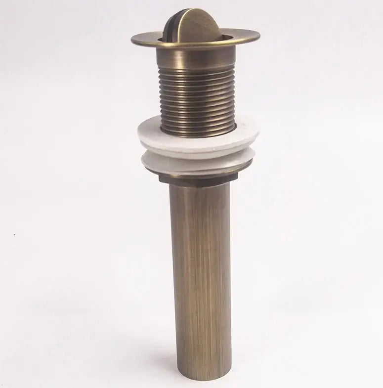 DecorBites™ antique brass vessel sink drain with fluted threaded top and white ceramic washers for bathroom use