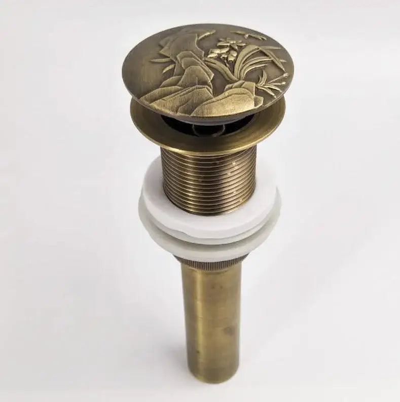 Decorbites™ antique brass vessel sink drain with detailed engraved floral and landscape design for bathroom use