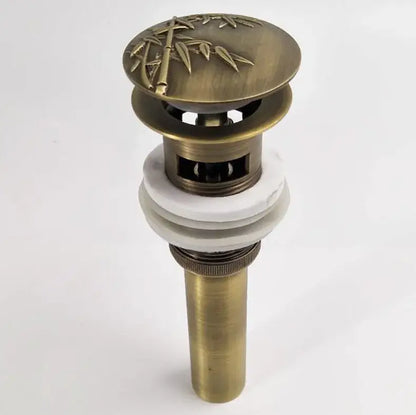 Antique brass vessel sink drain stopper with bamboo design and white ceramic sealing rings for bathroom use