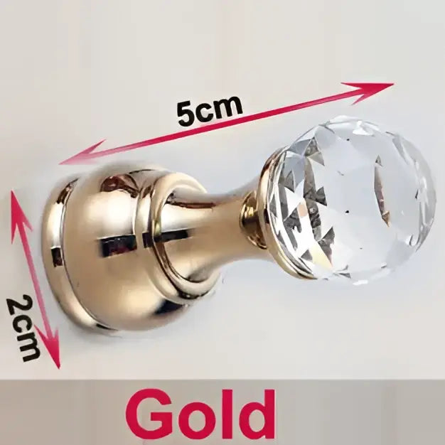 Decorbites™ antique brass wall clothes rack featuring gold-colored door knob with clear faceted crystal ball top