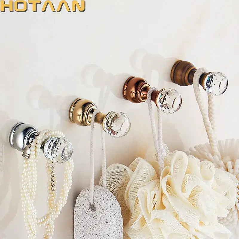 Decorbites antique brass wall clothes rack with clear crystal knob hooks in gold rose gold and silver finishes