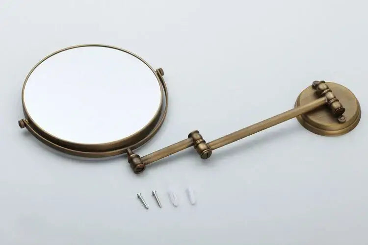 DecorBites antique brass wall dual side folding makeup mirror with 3x magnification and extendable arm in brass finish