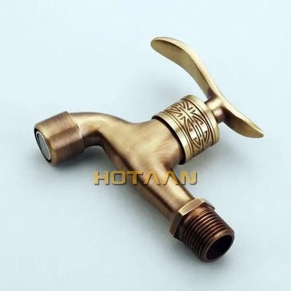 DecorBites antique brass wall mount bathroom faucet with ornate engraved detailing on brass wall mount handle and spout