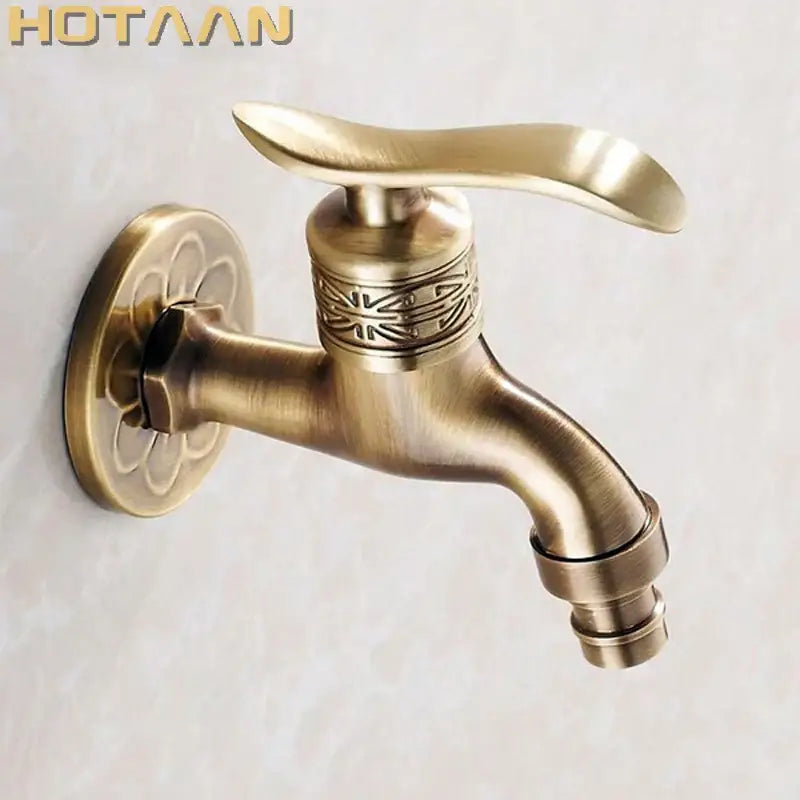 Decorbites antique brass wall mount bathroom faucet with ornate floral and geometric embossing in brass wall finish