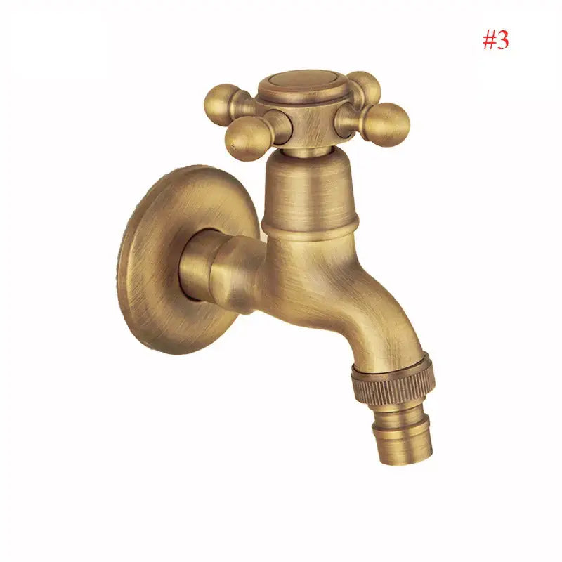 Antique brass wall mount garden faucet with cross handle and decorative spherical knobs for outdoor use