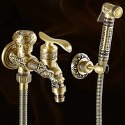 Decorbites™ antique brass wall mount bidet faucet with ornate dragon head design and matching handheld showerhead