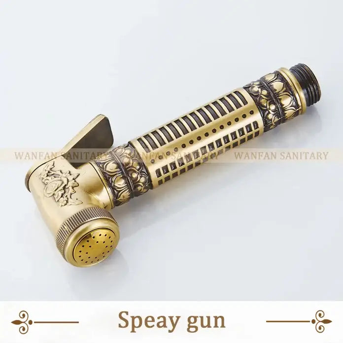 Decorbites™ antique brass wall mount bidet faucet in brass with ornate floral embossing for hygienic bathroom use
