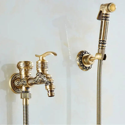 Brass wall mount bidet faucet with ornate dragon head design and matching handheld showerhead in antique brass finish