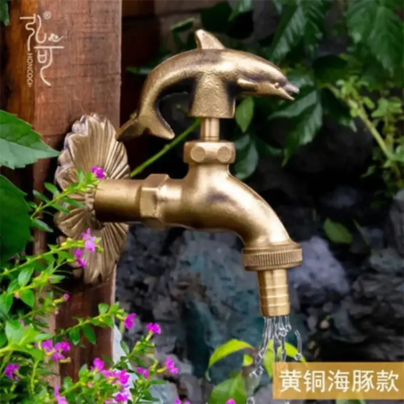 Decorbites antique brass wall mount garden faucet with brass dolphin design and decorative shell backplate