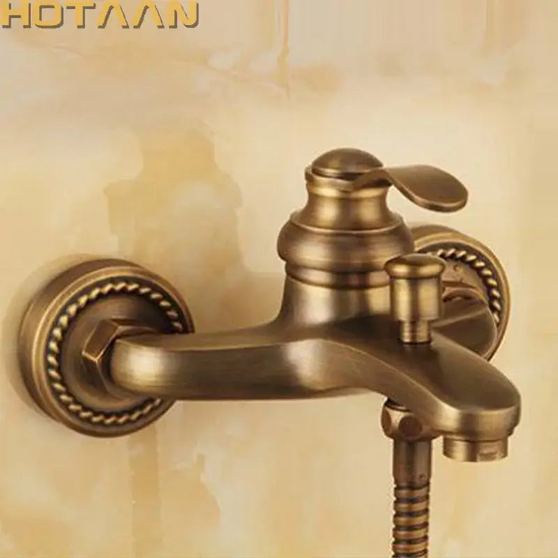 Decorbites antique brass wall mount hand held shower head kit with ornate rope detailing and flexible hose