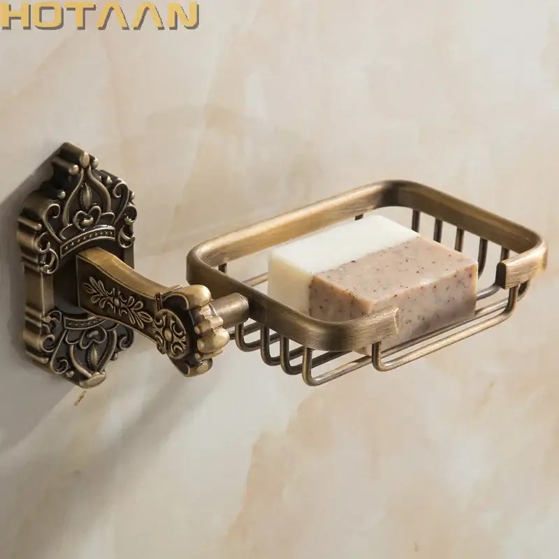 Decorbites™ antique brass wall mount soap basket featuring an ornate wire mesh tray holding two bars of soap