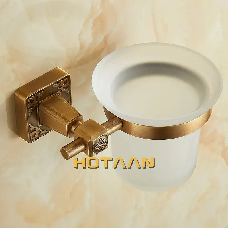 DecorBites antique brass wall mount brush holder with frosted glass cup and floral engraving for bathroom use