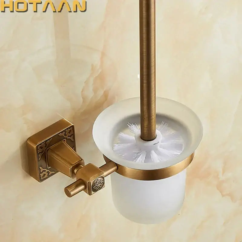 DecorBites antique brass wall mount toilet brush holder with frosted glass base and white bristle brush for bathrooms