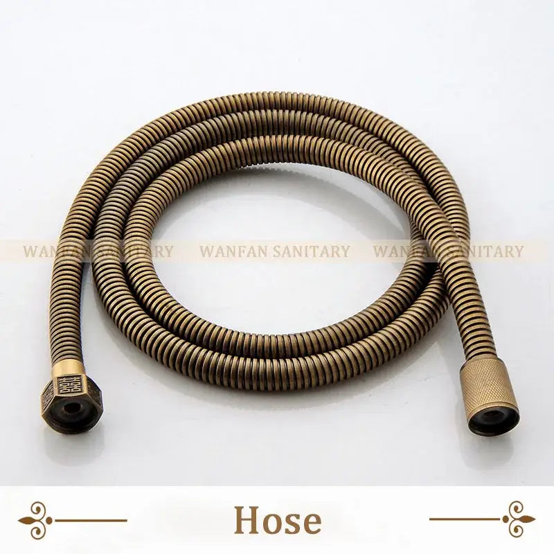 Antique brass wall mounted decorbites bidet faucet with flexible corrugated brass hose and textured metallic ends