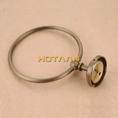 DecorBites antique brass wall-mounted round towel ring holder with a sturdy mounting base for secure installation