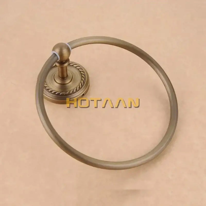 DecorBites antique brass towel ring holder with decorative rope-twist base and smooth circular ring holder design