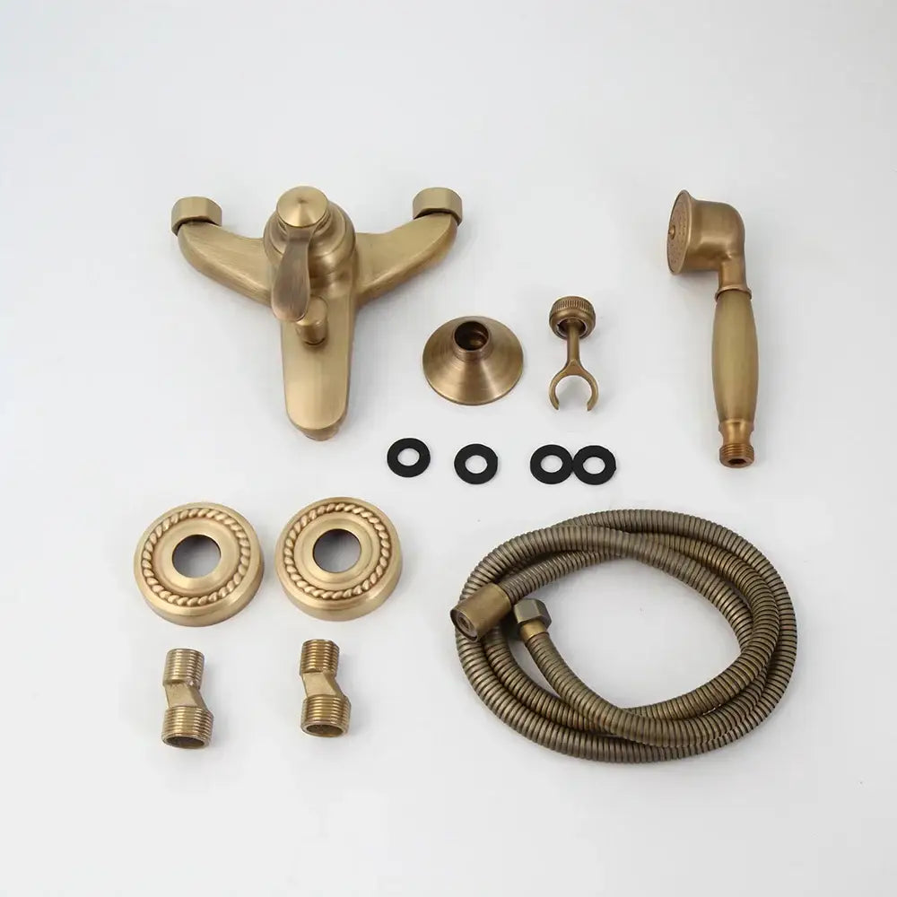 Brass-finished antique brass wall mounted shower faucet set with matching handheld showerhead and coiled hose by DecorBites