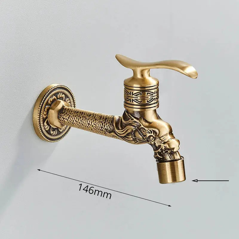 Decorbites™ antique brass wall mounted washing machine faucet with ornate dragon head and intricate engraved patterns